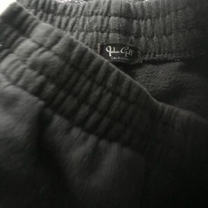 Brandy Melville Pants - Black sweat pants with white stripes Brandy Melville Pants - Black sweat pants with white stripes